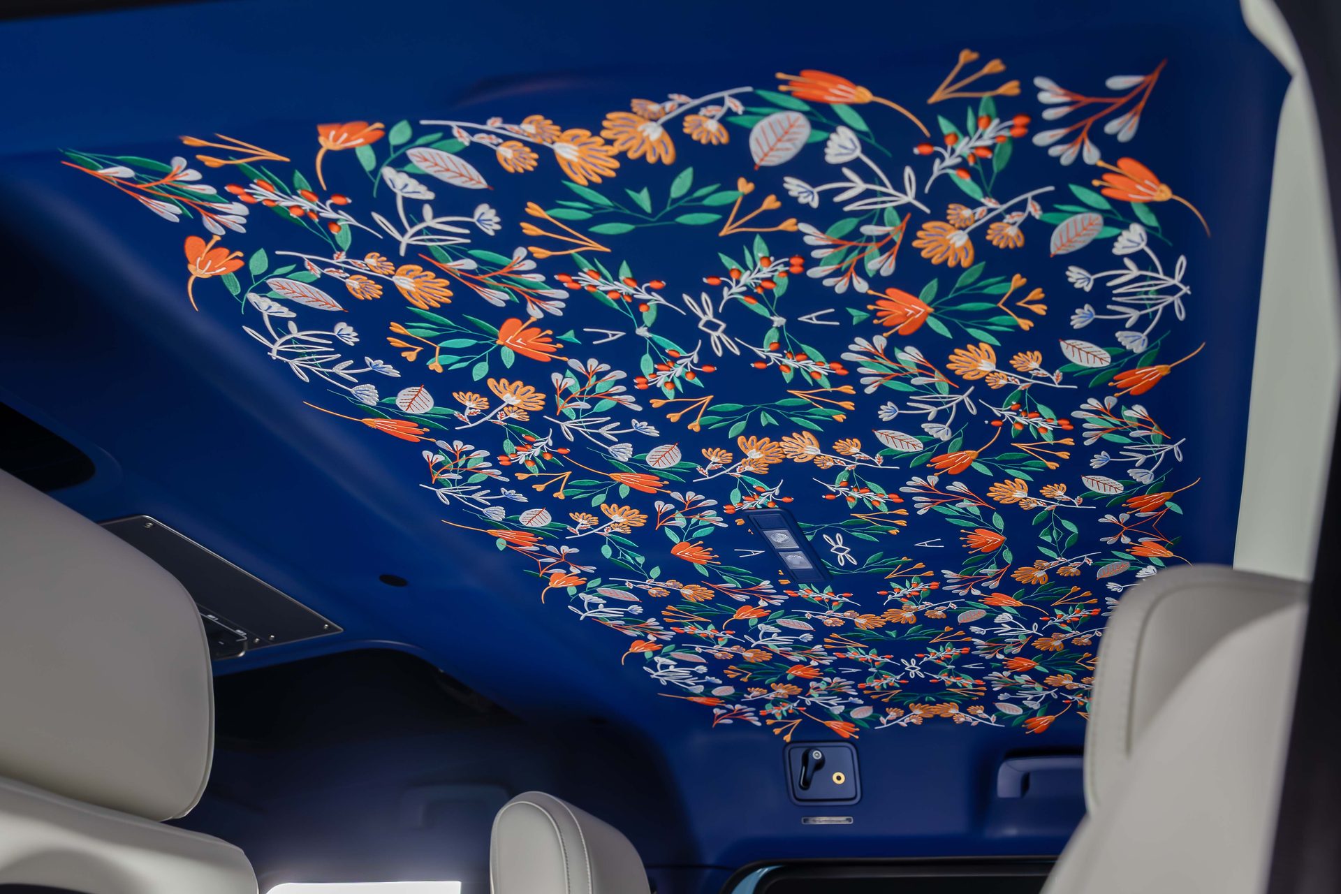 Record car: fully embroidered floral headliner