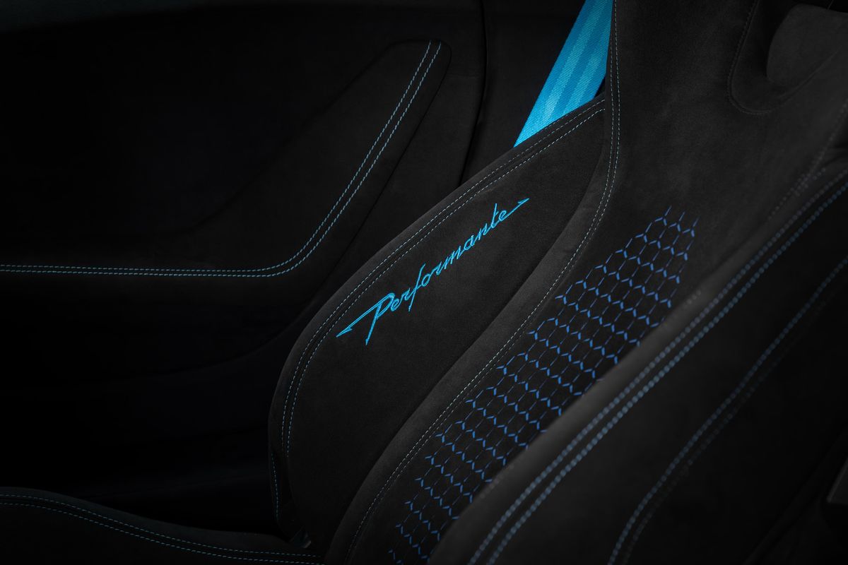Script logo and hexagon pattern on the seat side